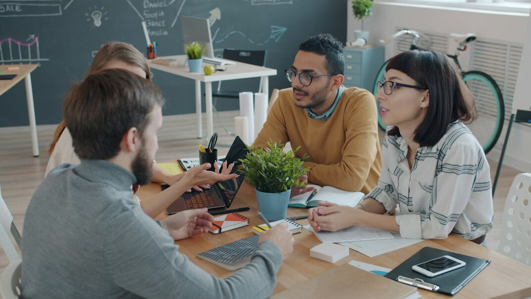 group of people in discussion