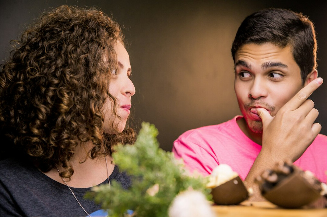 person discussing facts with friend