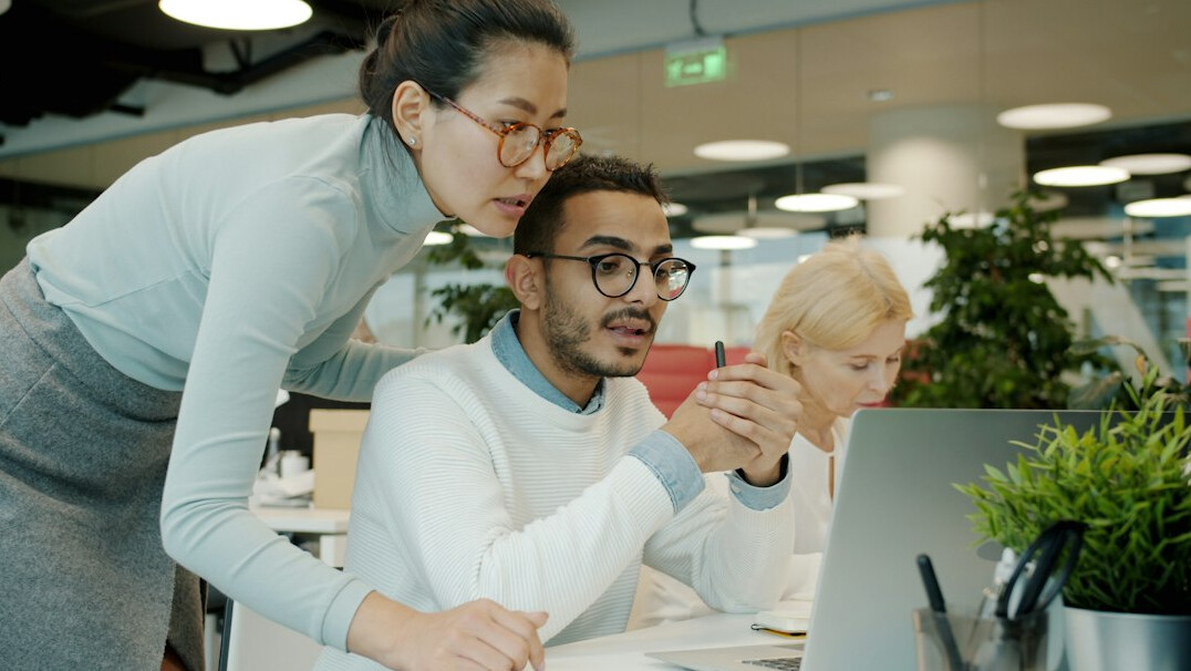 team analyzing data in office