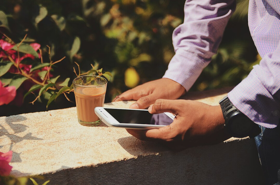 person checking phone for facts