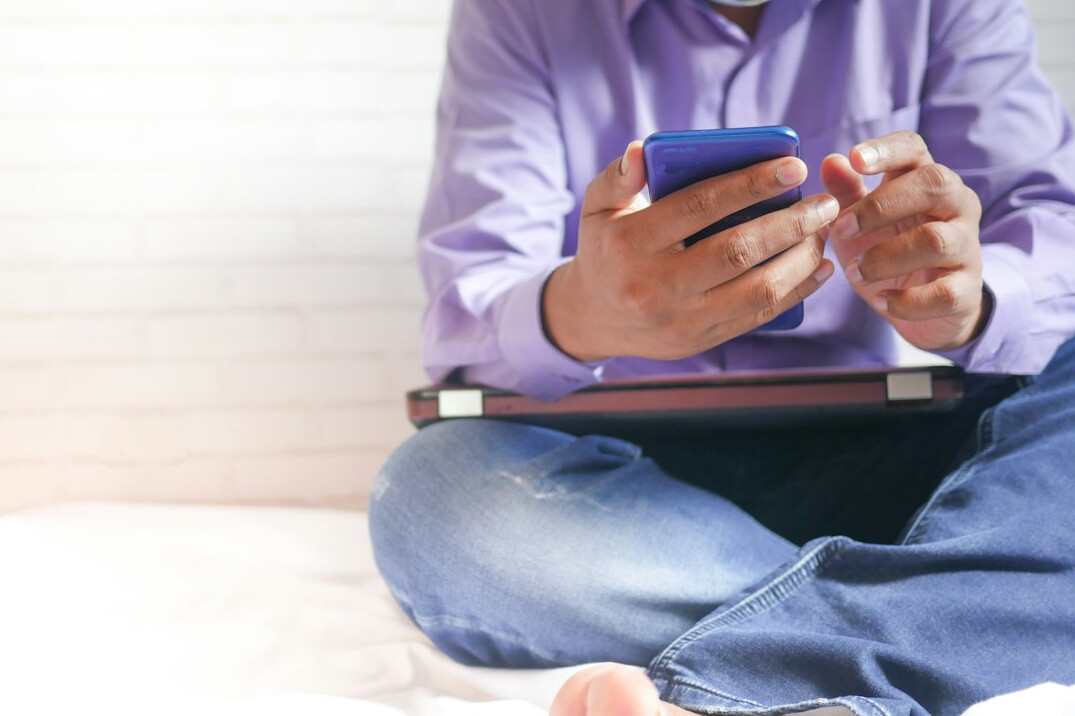 person checking phone for facts