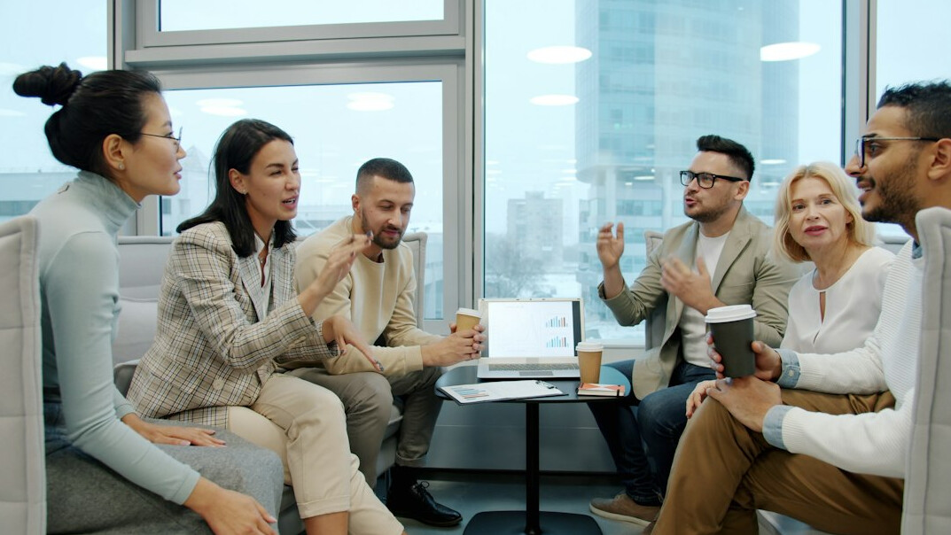 diverse group discussing